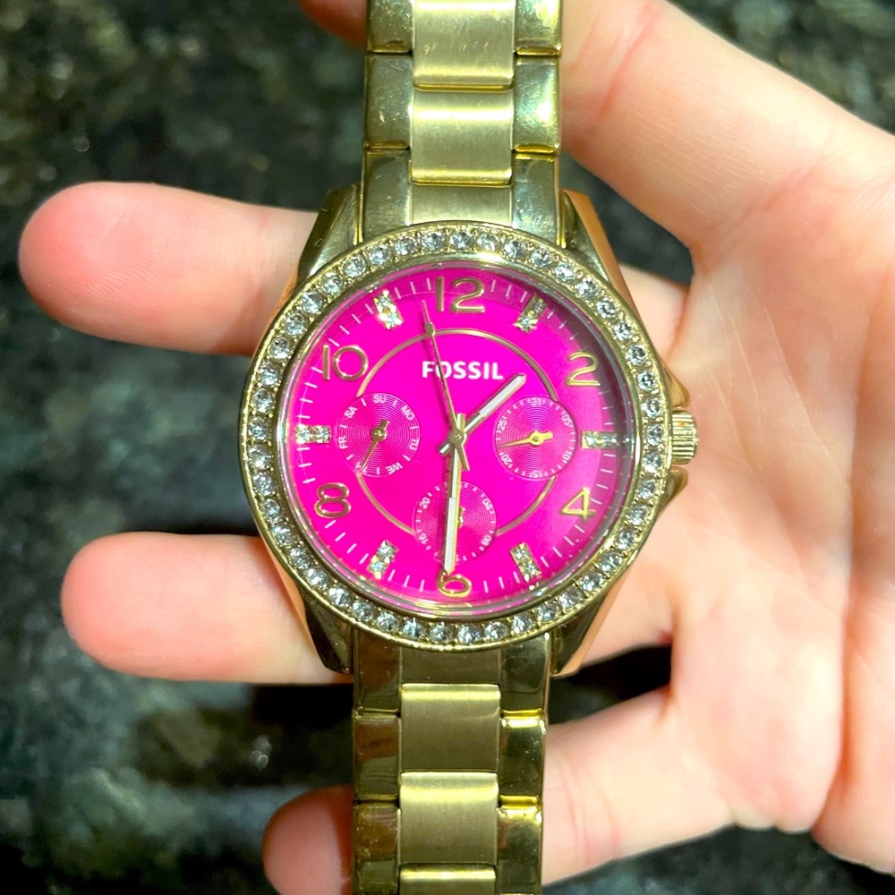 Gold and pink Fossil watch